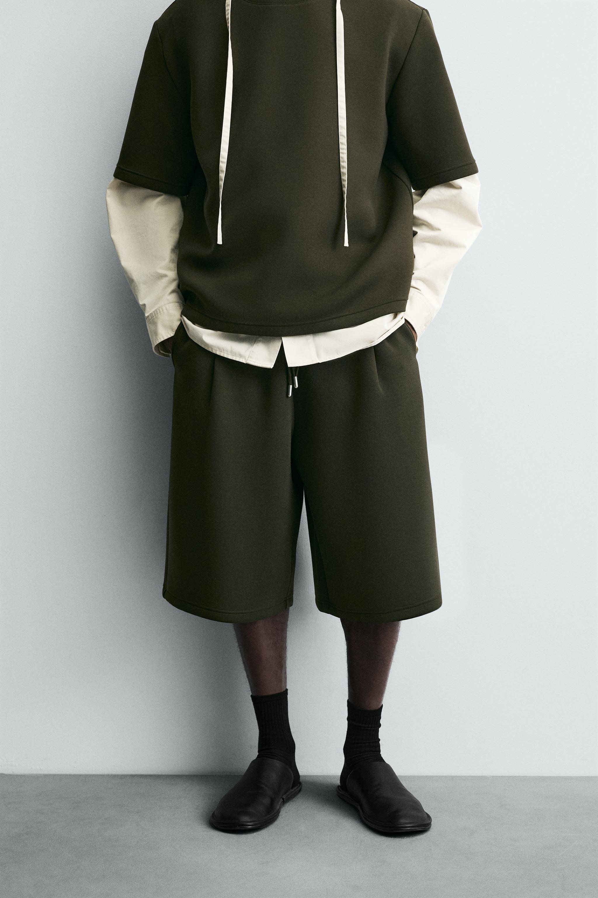 NEOPRENE EFFECT SHORTS WITH DARTS